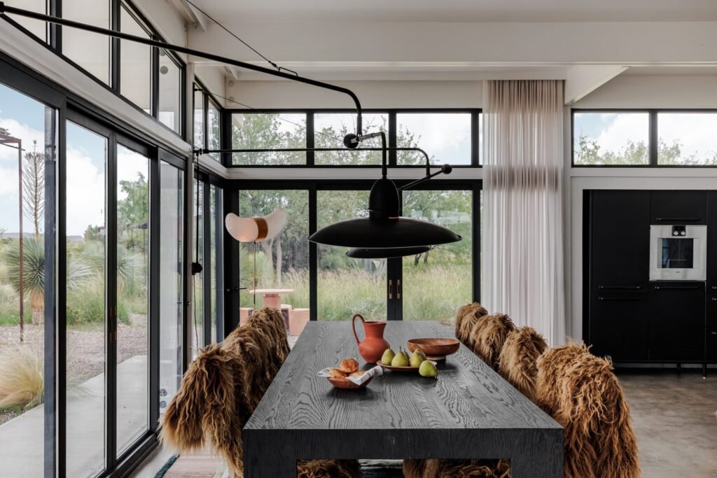 A £2.2m desert ranch near Marfa, Texas, once loved by A-listers, is for sale featuring stunning mountain views, modern design, and complete privacy on 10 acres.