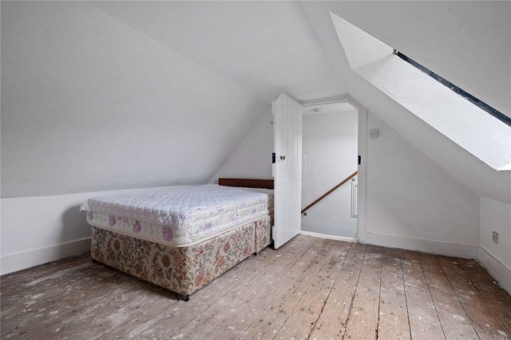 A four-bedroom stone cottage near Loch Torridon is for sale at £550,000, offering nine acres of land, rustic charm, and a private seven-acre island in the Scottish Highlands.