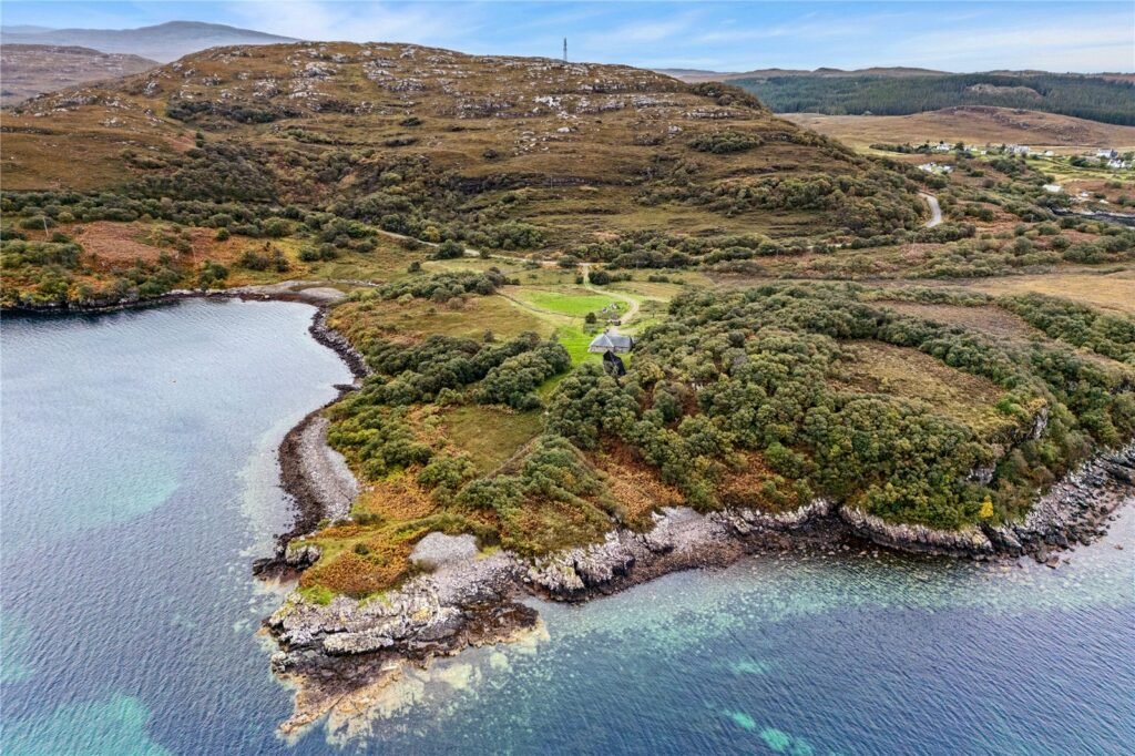 A four-bedroom stone cottage near Loch Torridon is for sale at £550,000, offering nine acres of land, rustic charm, and a private seven-acre island in the Scottish Highlands.