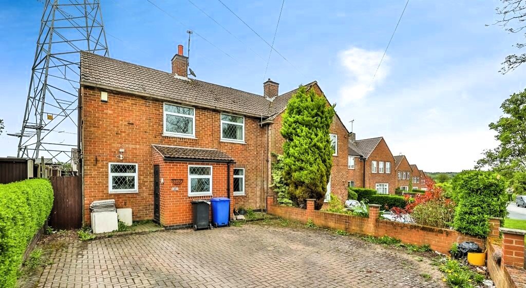 A three-bed home priced at £190,000 is turning heads due to a huge electricity pylon towering over its garden, casting a shadow across the conservatory and outdoor space.