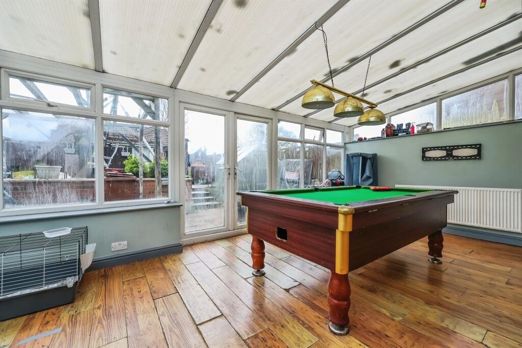 A three-bed home priced at £190,000 is turning heads due to a huge electricity pylon towering over its garden, casting a shadow across the conservatory and outdoor space.