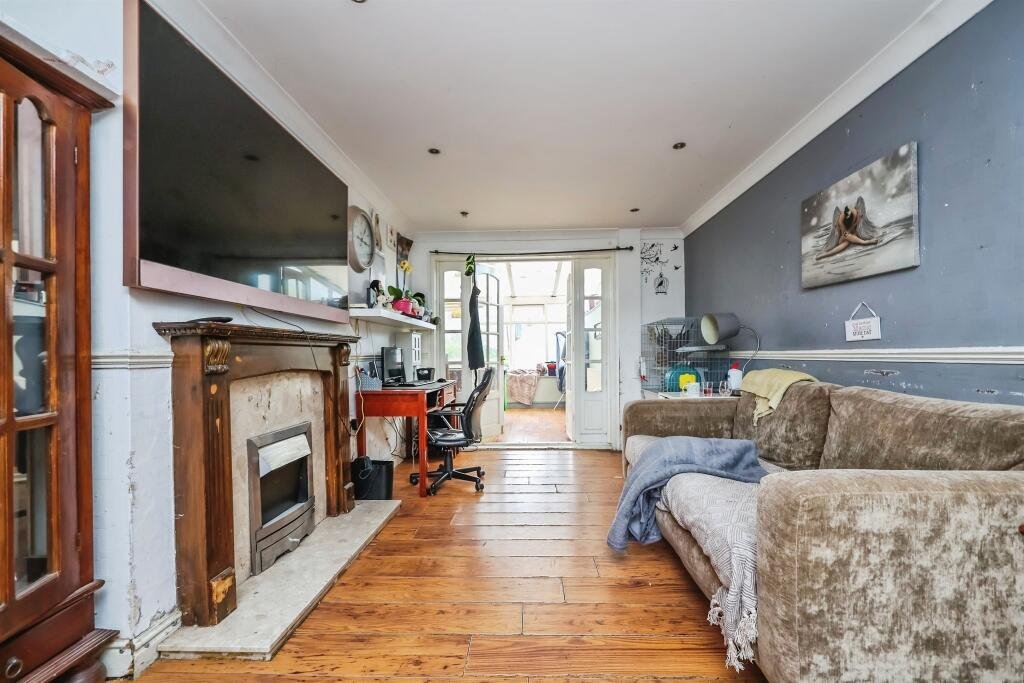 A three-bed home priced at £190,000 is turning heads due to a huge electricity pylon towering over its garden, casting a shadow across the conservatory and outdoor space.