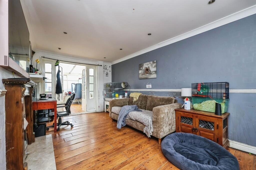 A three-bed home priced at £190,000 is turning heads due to a huge electricity pylon towering over its garden, casting a shadow across the conservatory and outdoor space.