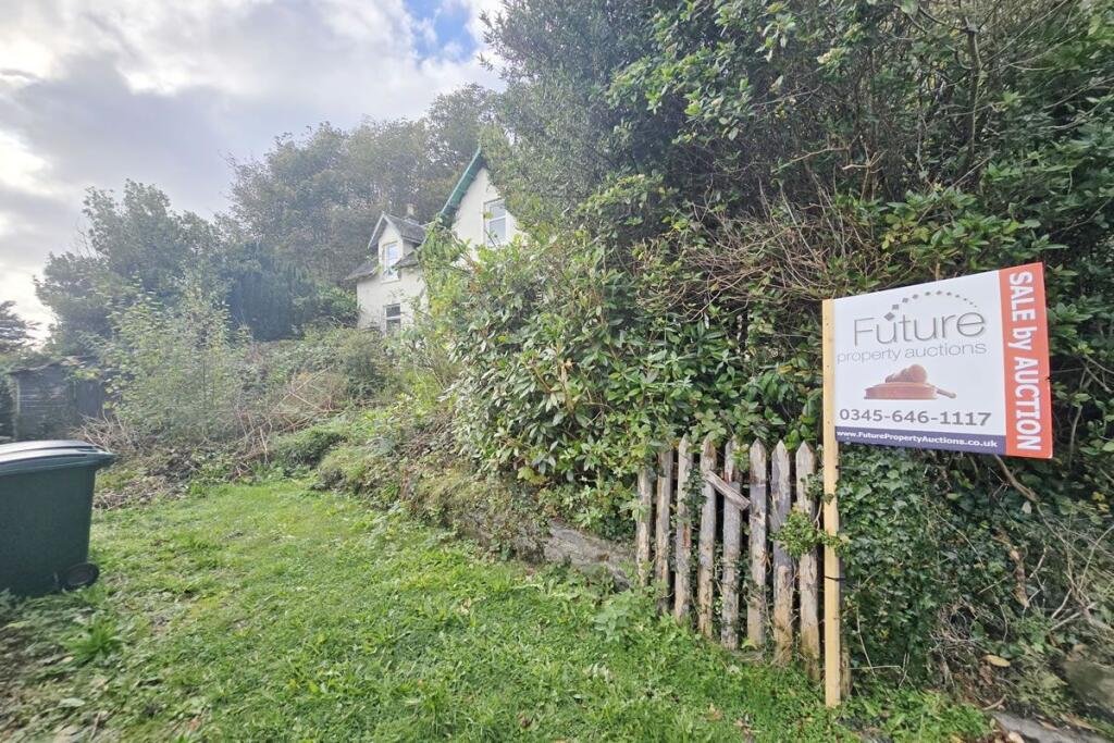 A three-bedroom seaside house near Glasgow is selling for just £60,000, but eerie graffiti reading Help us inside has made this so-called dream home a spooky bargain.