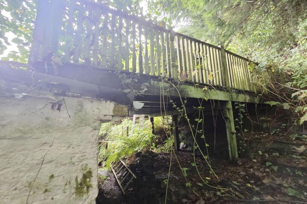 A three-bedroom seaside house near Glasgow is selling for just £60,000, but eerie graffiti reading Help us inside has made this so-called dream home a spooky bargain.