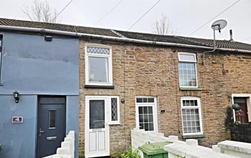 A tiny one-bed house in Pontypridd just five feet wide is on sale for £92,000, featuring a compact open-plan lounge, modern shower room and small front and back gardens.
