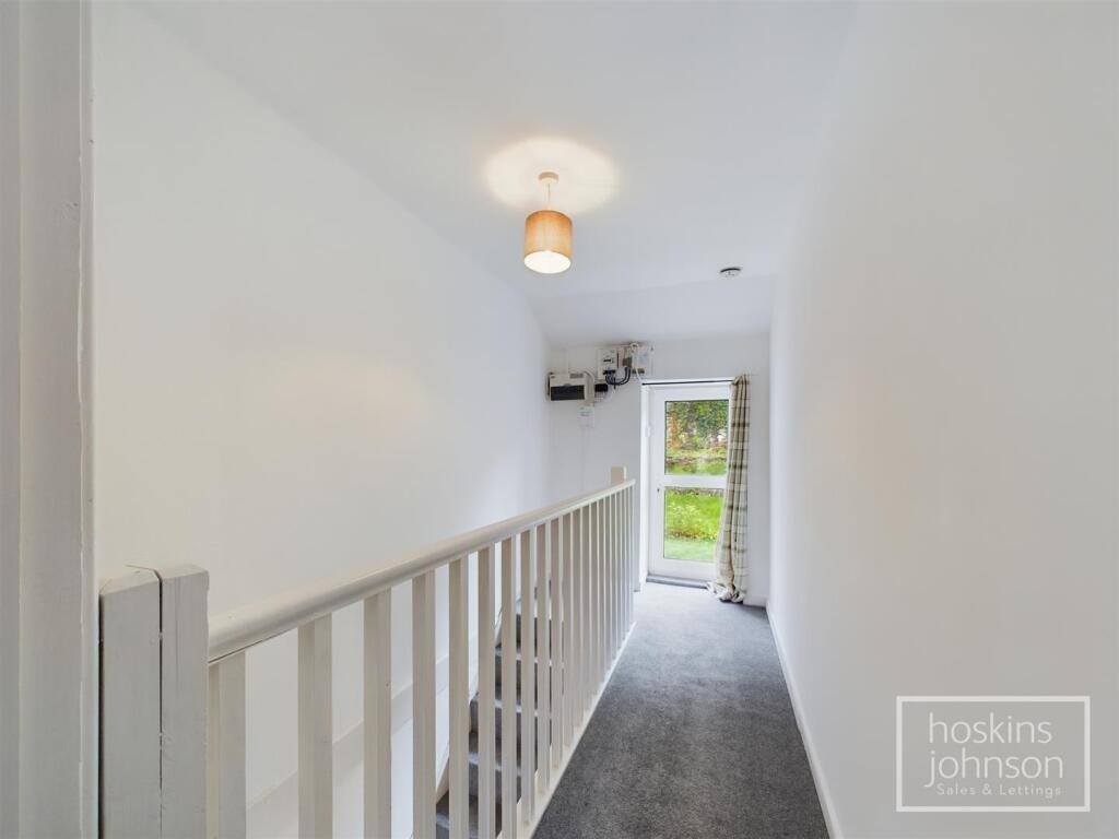 A tiny one-bed house in Pontypridd just five feet wide is on sale for £92,000, featuring a compact open-plan lounge, modern shower room and small front and back gardens.