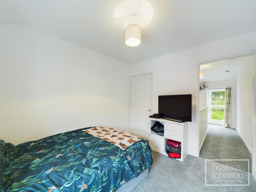 A tiny one-bed house in Pontypridd just five feet wide is on sale for £92,000, featuring a compact open-plan lounge, modern shower room and small front and back gardens.