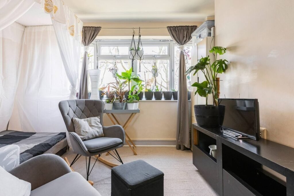 A tiny London studio flat in Bermondsey costs £1,390 a month and requires tenants earning £51,000 a year, with strict rules banning pets, smoking, parties and even a real bed.