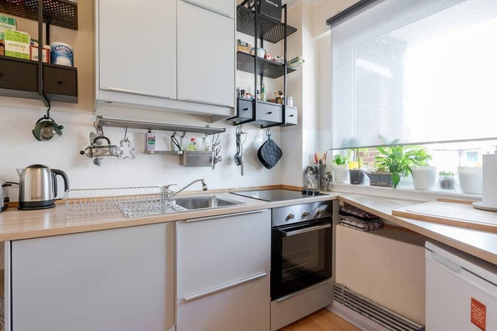 A tiny London studio flat in Bermondsey costs £1,390 a month and requires tenants earning £51,000 a year, with strict rules banning pets, smoking, parties and even a real bed.
