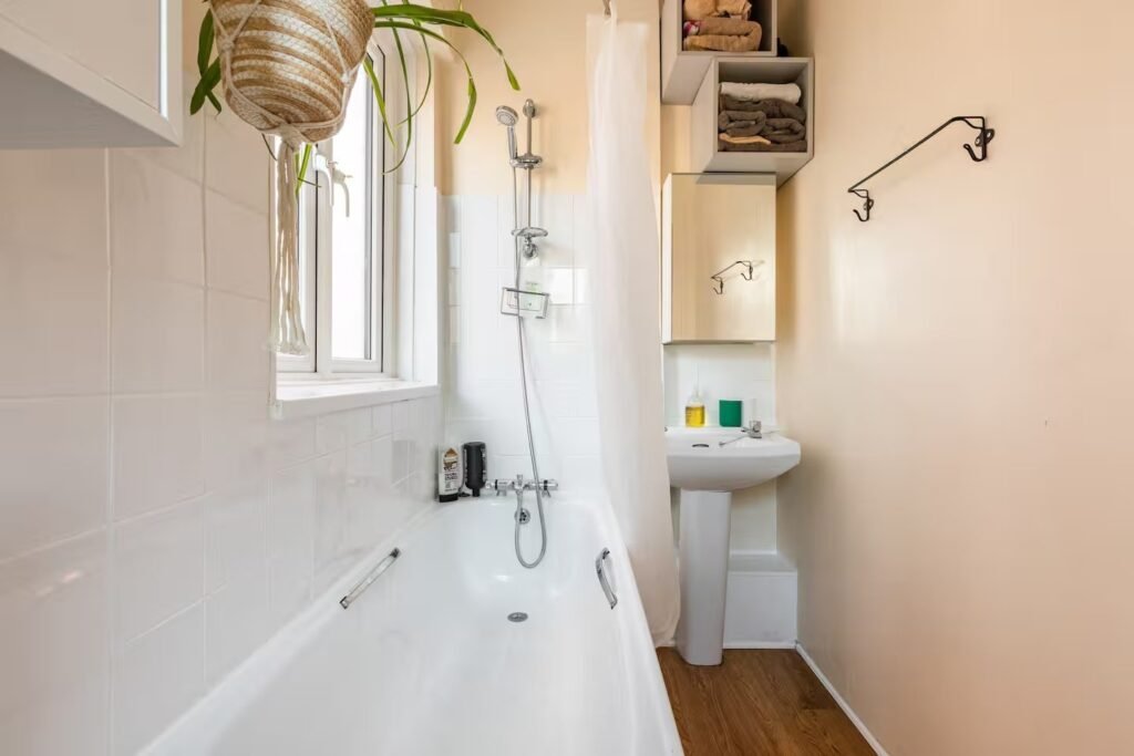 A tiny London studio flat in Bermondsey costs £1,390 a month and requires tenants earning £51,000 a year, with strict rules banning pets, smoking, parties and even a real bed.