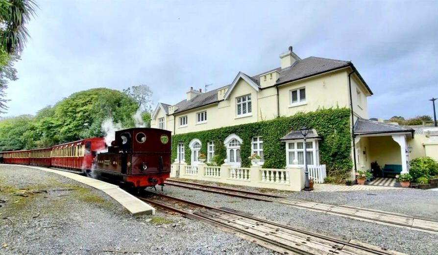 Former Isle of Man steam railway station built in 1874 goes on sale for £750,000, offering four bedrooms, historic charm and steam trains passing just yards away.