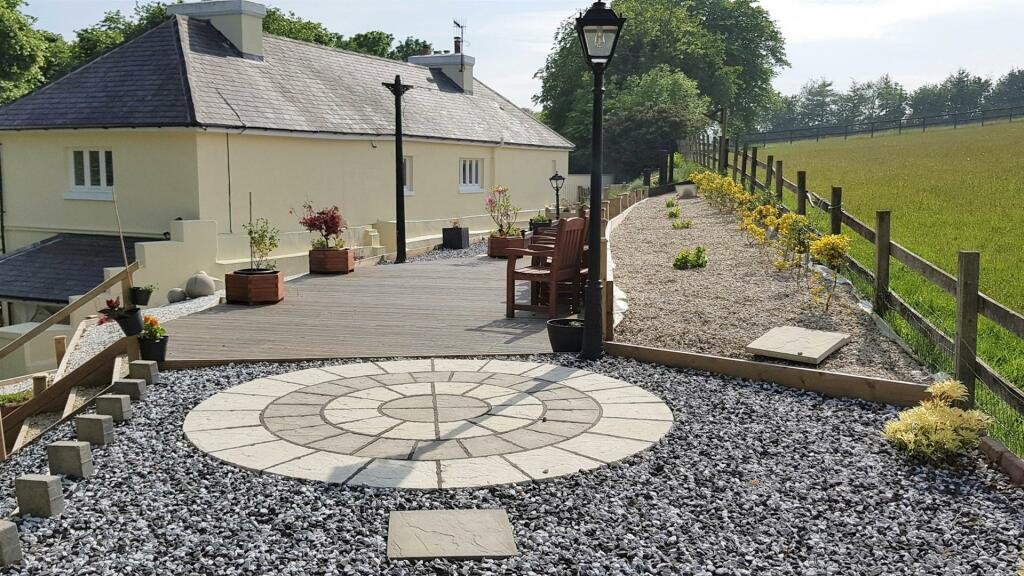 Former Isle of Man steam railway station built in 1874 goes on sale for £750,000, offering four bedrooms, historic charm and steam trains passing just yards away.