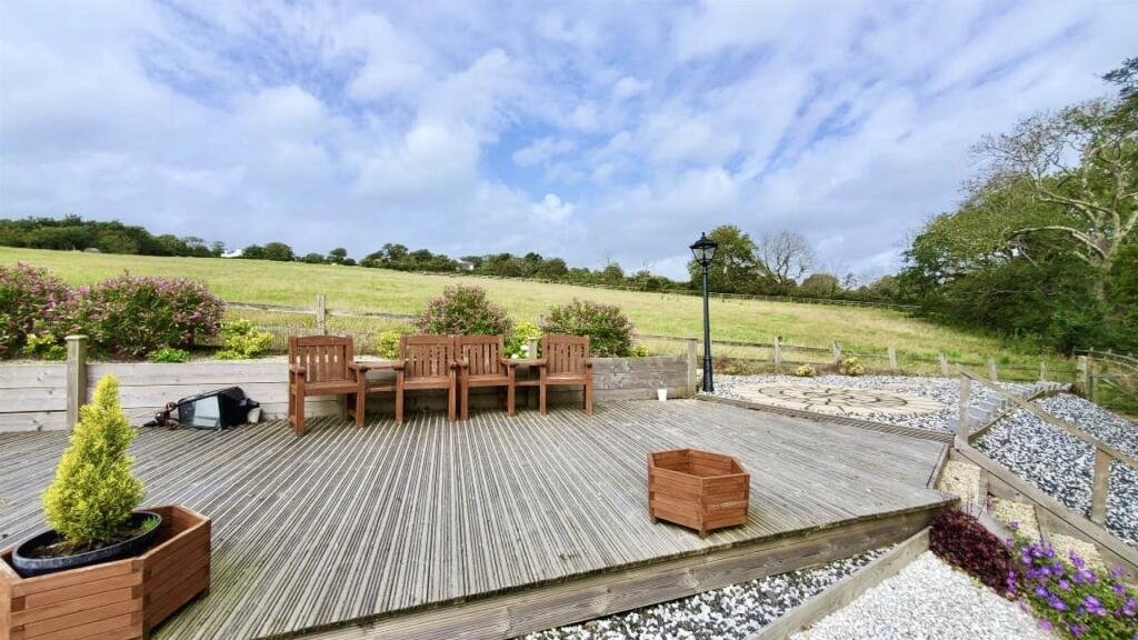 Former Isle of Man steam railway station built in 1874 goes on sale for £750,000, offering four bedrooms, historic charm and steam trains passing just yards away.