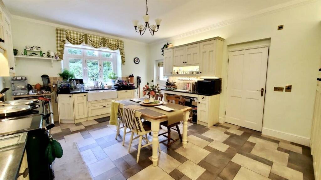 Former Isle of Man steam railway station built in 1874 goes on sale for £750,000, offering four bedrooms, historic charm and steam trains passing just yards away.