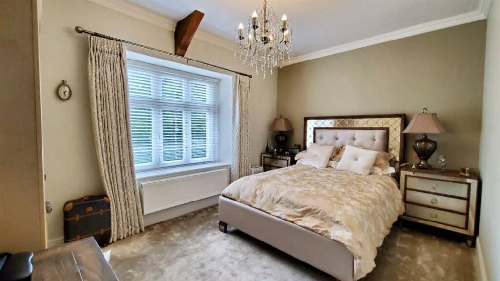 Former Isle of Man steam railway station built in 1874 goes on sale for £750,000, offering four bedrooms, historic charm and steam trains passing just yards away.