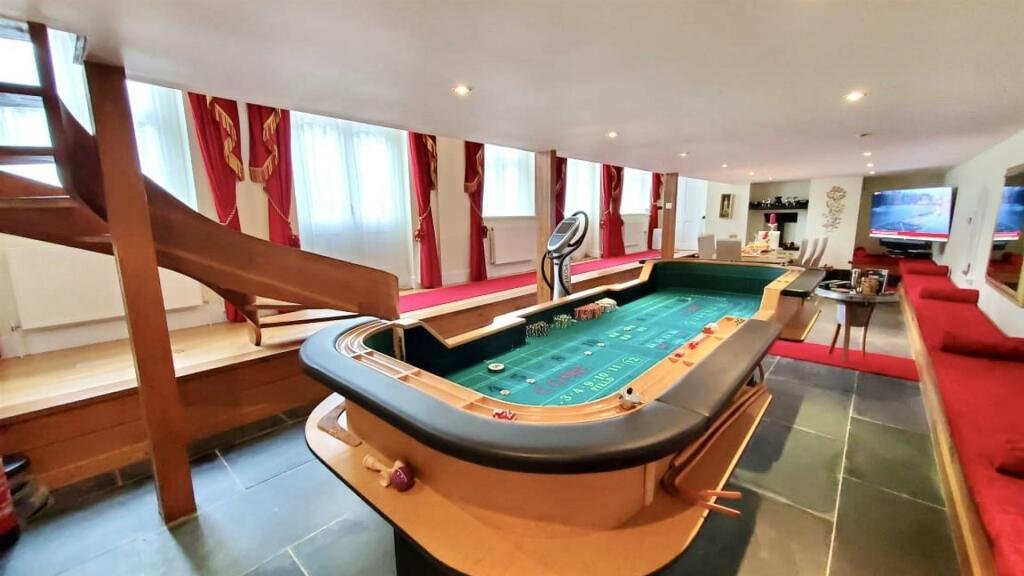 Former Isle of Man steam railway station built in 1874 goes on sale for £750,000, offering four bedrooms, historic charm and steam trains passing just yards away.