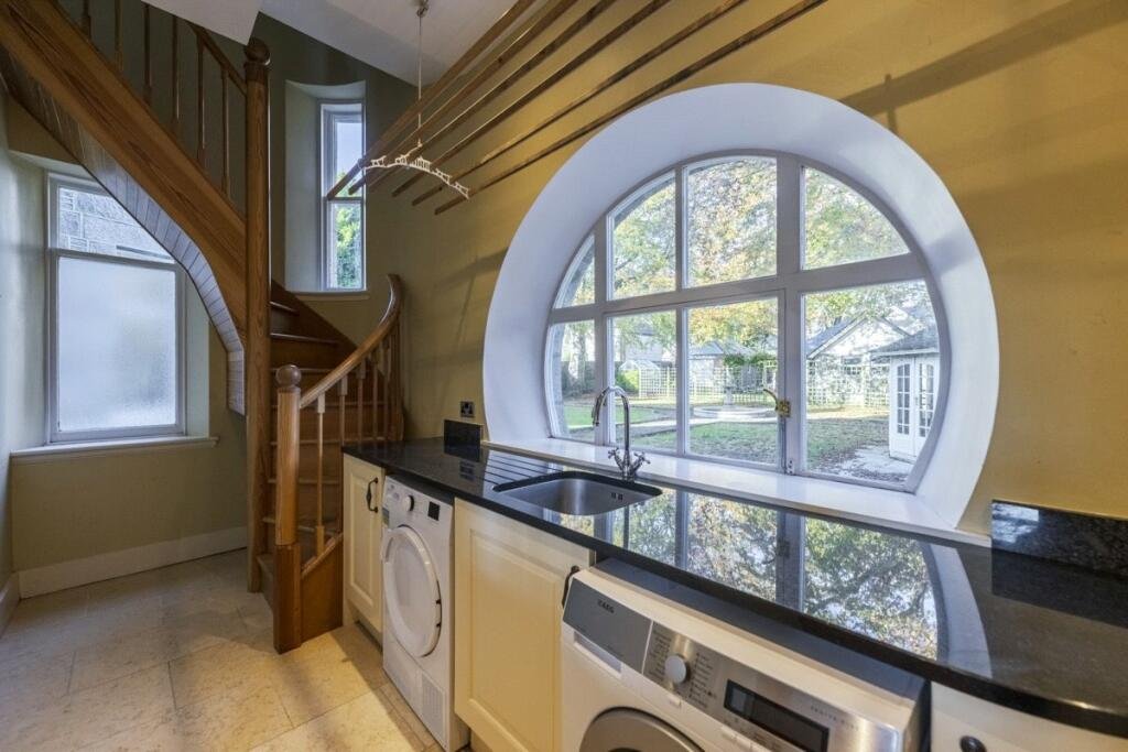 A stunning £1.5m pink granite storybook castle in Aberdeen hits the market offering eight bedrooms grand period details stained glass turrets and lavish interiors in a restored A listed home.