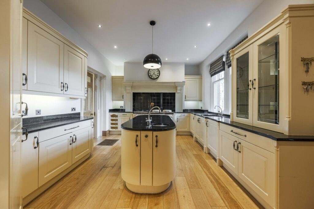 A stunning £1.5m pink granite storybook castle in Aberdeen hits the market offering eight bedrooms grand period details stained glass turrets and lavish interiors in a restored A listed home.