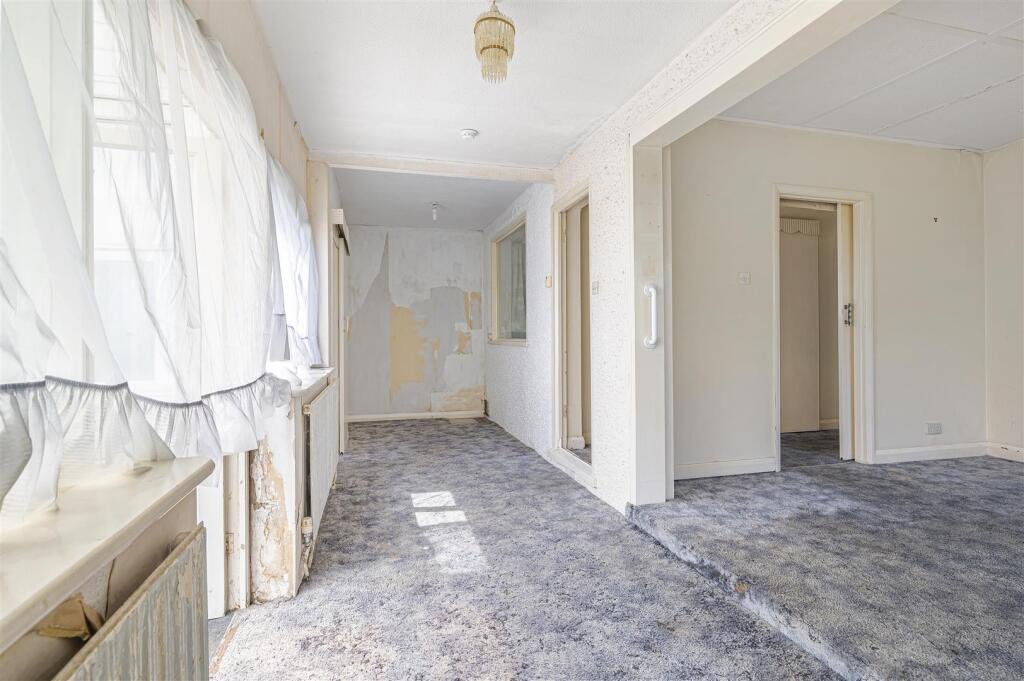 A £445,000 cliff top bungalow in Peacehaven offers stunning sea views and huge renovation potential on a 40 metre plot, despite nearby erosion concerns, making it a rare coastal project.