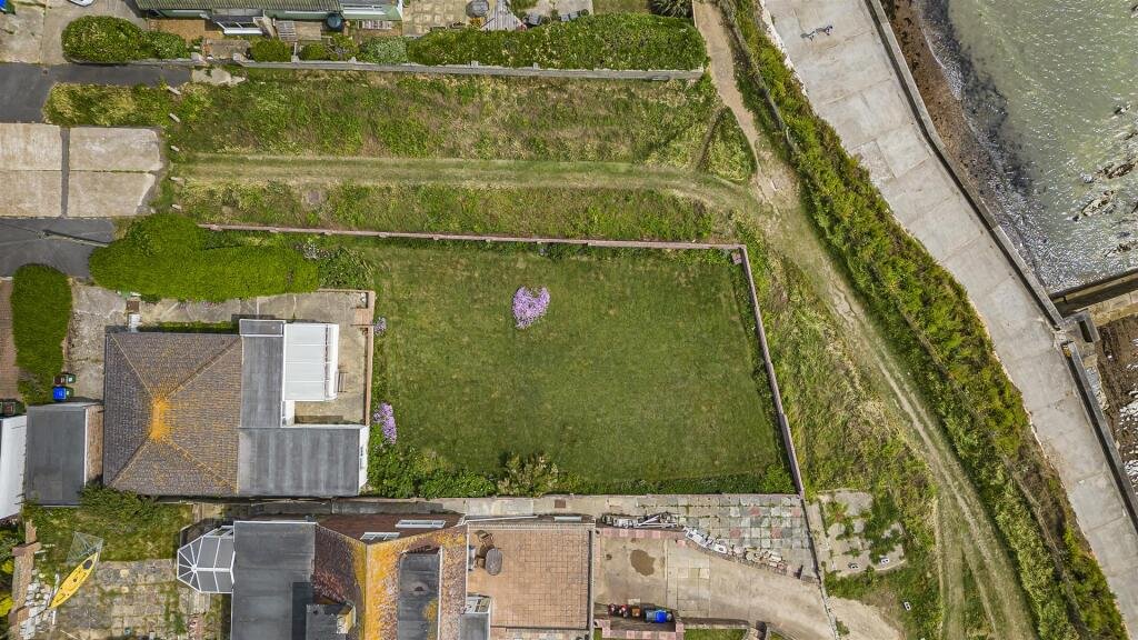 A £445,000 cliff top bungalow in Peacehaven offers stunning sea views and huge renovation potential on a 40 metre plot, despite nearby erosion concerns, making it a rare coastal project.