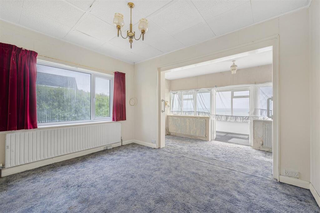 A £445,000 cliff top bungalow in Peacehaven offers stunning sea views and huge renovation potential on a 40 metre plot, despite nearby erosion concerns, making it a rare coastal project.