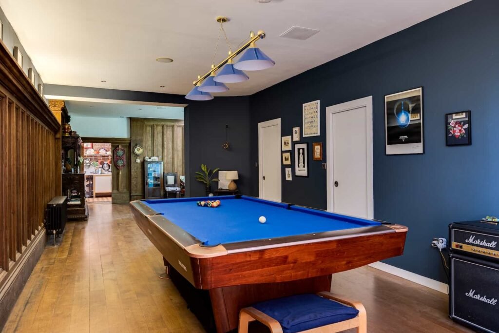 Fairytale Gothic mansion with Capability Brown gardens goes on sale for £700k offering dramatic halls secret rooms private cinema bar and historic charm in Wales.