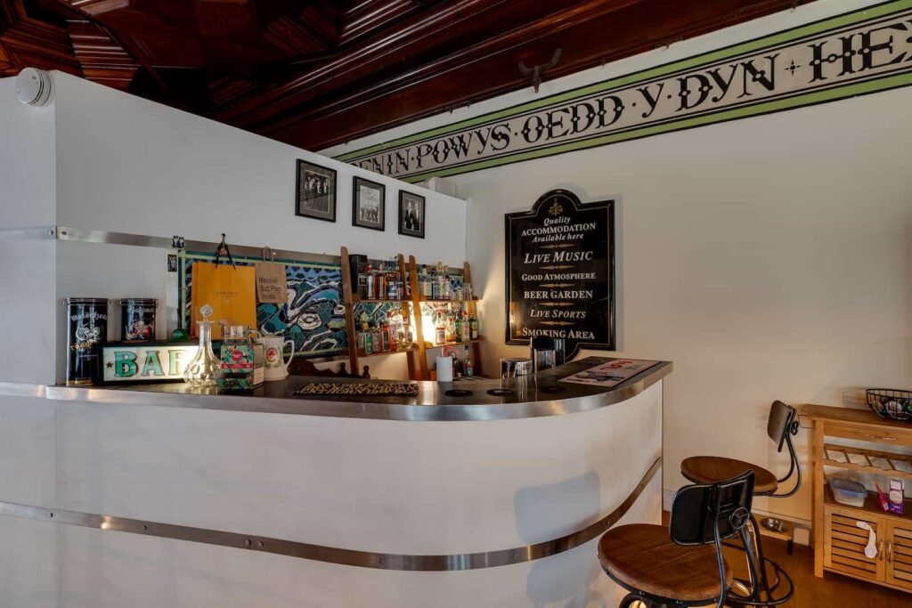 Fairytale Gothic mansion with Capability Brown gardens goes on sale for £700k offering dramatic halls secret rooms private cinema bar and historic charm in Wales.