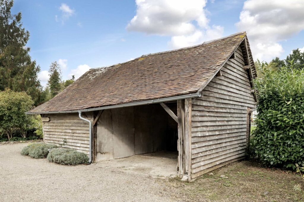 A £350,000 fairytale cottage rebuilt stone by stone in a picturesque village is for sale, offering beams, cosy charm, gardens, a pond and idyllic countryside living in Yarpole.