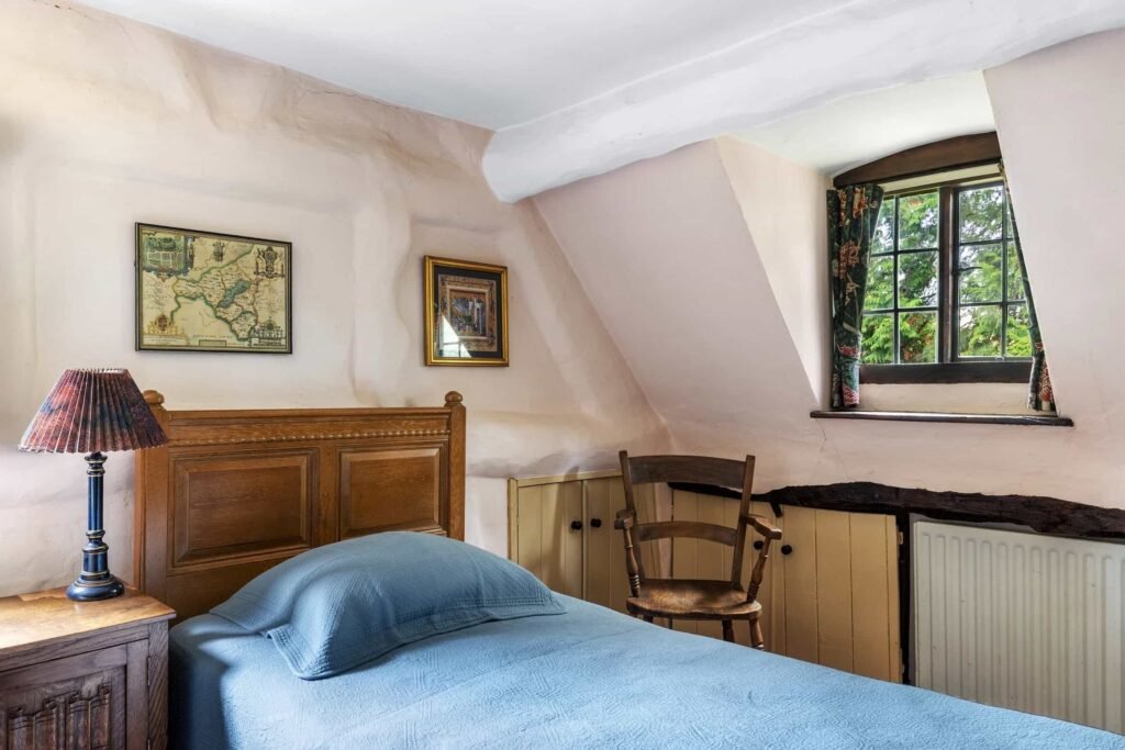 A £350,000 fairytale cottage rebuilt stone by stone in a picturesque village is for sale, offering beams, cosy charm, gardens, a pond and idyllic countryside living in Yarpole.