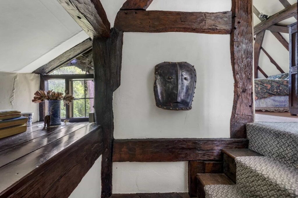 A £350,000 fairytale cottage rebuilt stone by stone in a picturesque village is for sale, offering beams, cosy charm, gardens, a pond and idyllic countryside living in Yarpole.