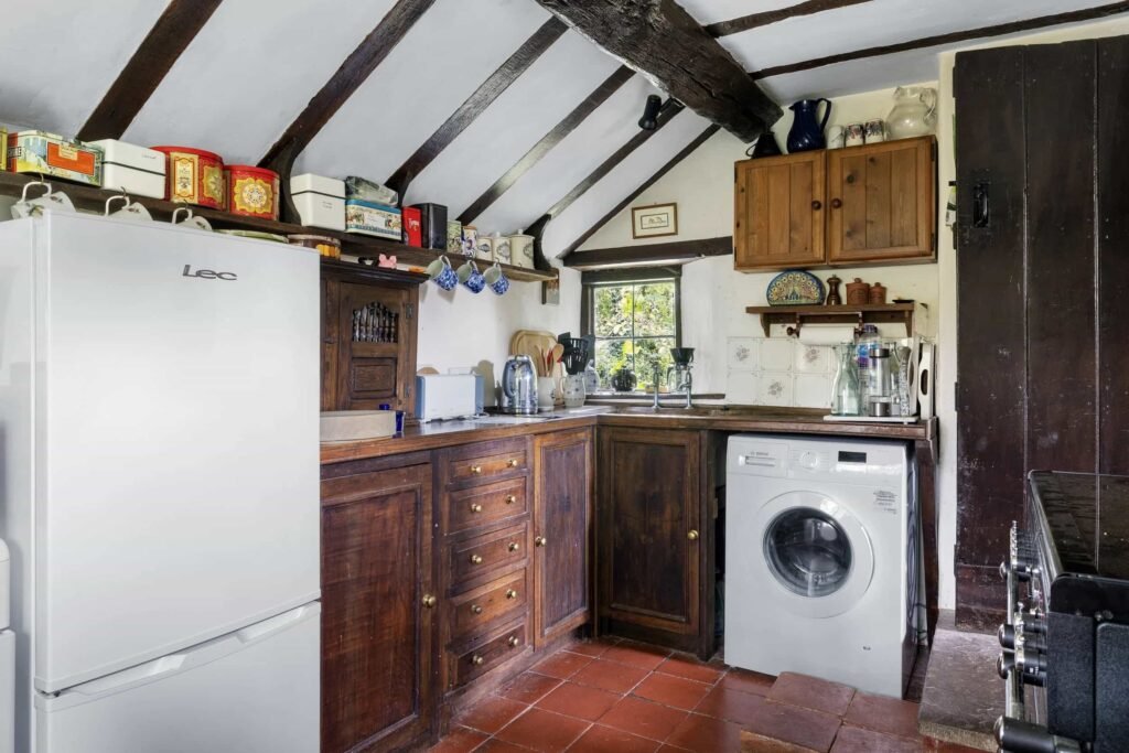 A £350,000 fairytale cottage rebuilt stone by stone in a picturesque village is for sale, offering beams, cosy charm, gardens, a pond and idyllic countryside living in Yarpole.