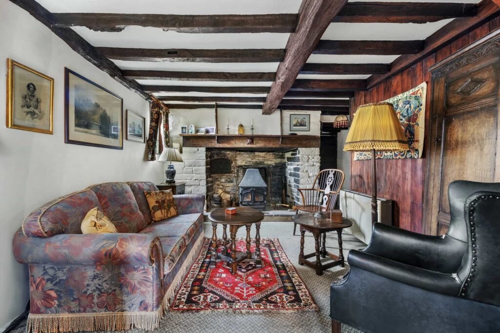 A £350,000 fairytale cottage rebuilt stone by stone in a picturesque village is for sale, offering beams, cosy charm, gardens, a pond and idyllic countryside living in Yarpole.