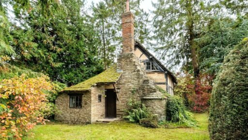 A £350,000 fairytale cottage rebuilt stone by stone in a picturesque village is for sale, offering beams, cosy charm, gardens, a pond and idyllic countryside living in Yarpole.