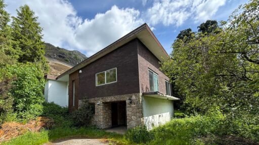 1970s time capsule home hits the market for £255,000, offering five bedrooms, retro charm and huge renovation potential in rural Powys village with gardens and garage for buyers seeking.