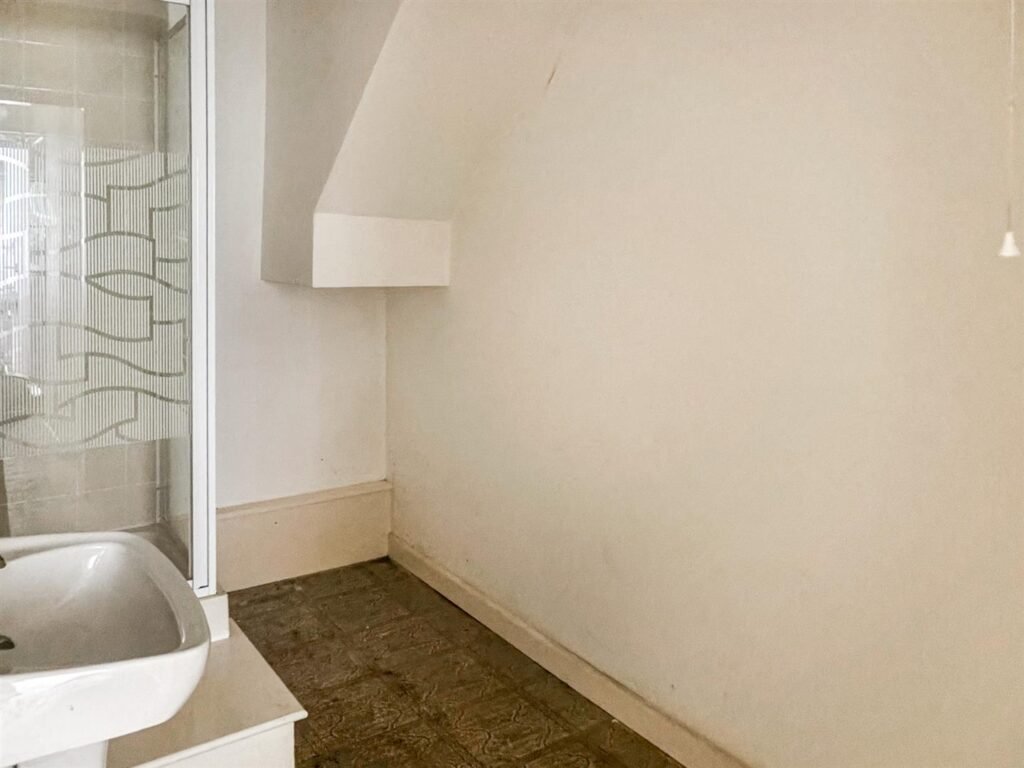 1970s time capsule home hits the market for £255,000, offering five bedrooms, retro charm and huge renovation potential in rural Powys village with gardens and garage for buyers seeking.