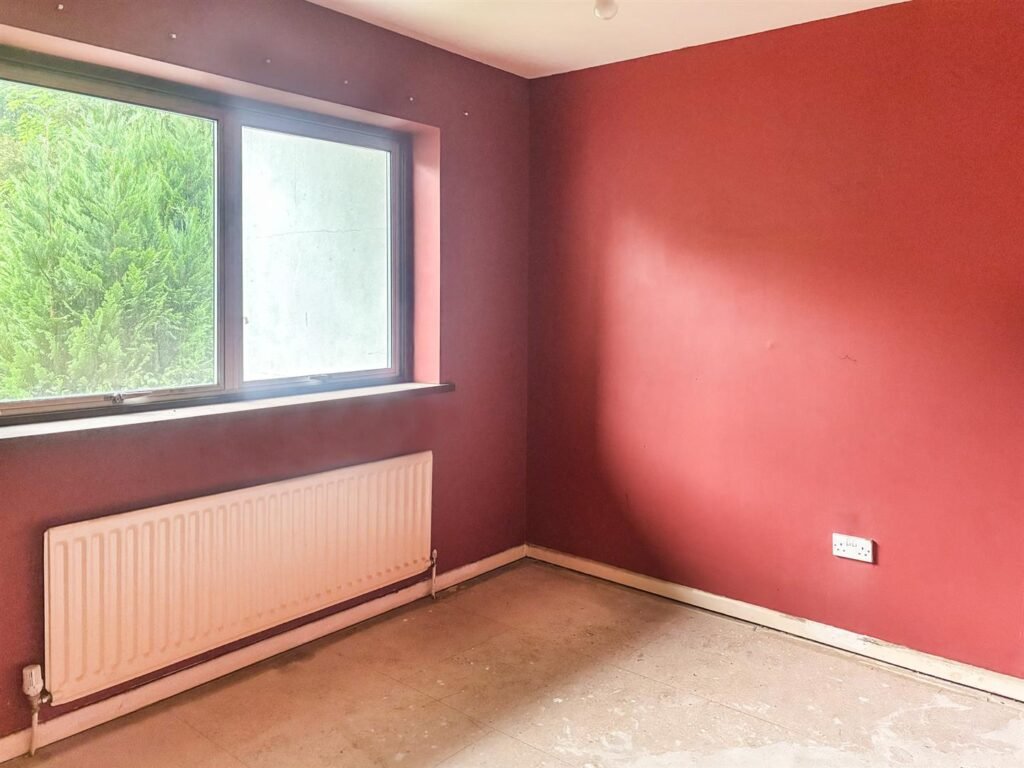 1970s time capsule home hits the market for £255,000, offering five bedrooms, retro charm and huge renovation potential in rural Powys village with gardens and garage for buyers seeking.