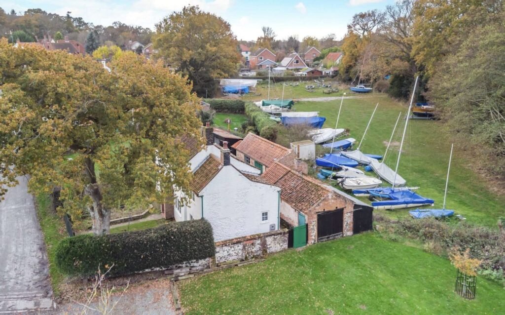 A historic three bedroom Norfolk Broads cottage hits the market for the first time in 235 years, offering rich heritage, water views and huge renovation potential.