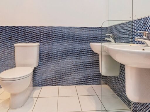 A £230,000 Durham townhouse has gone viral for its bizarre bathroom layout featuring two sinks divided by a glass panel, offering 1,565 sq ft and major fixer upper potential.