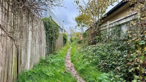 A £5000 strip of land in St Leonards on Sea is up for auction offering just a narrow public footpath through an industrial estate with buyers responsible for maintaining the muddy route.