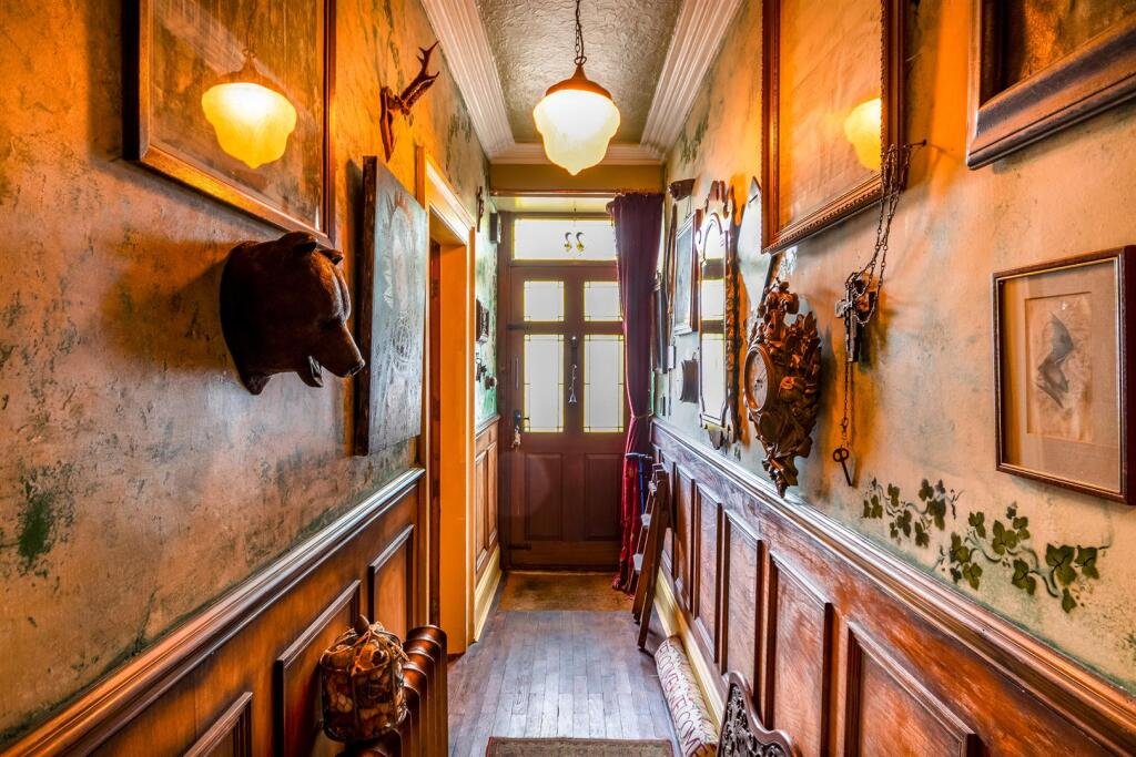 A £240000 period home in Rotherham charms with character and four floors of elegant features but shocks buyers with a mysterious strapped chair hidden in its basement sparking curiosity.