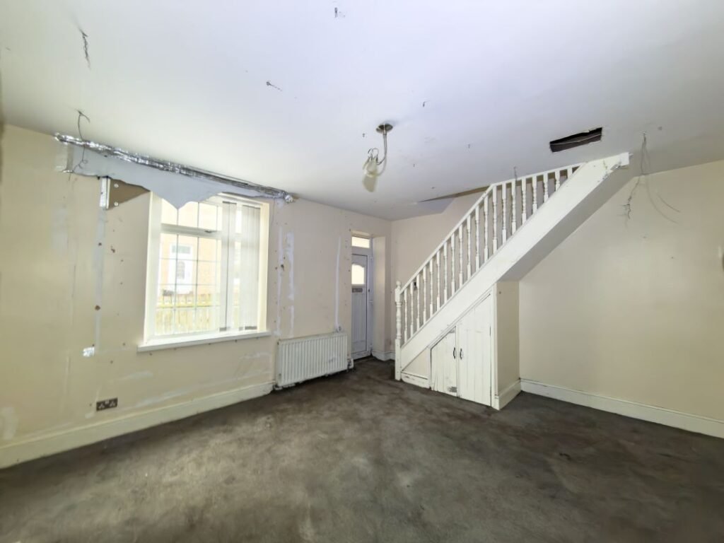 A quirky £80000 Burnopfield home hits auction featuring a bizarre bathroom with a toilet between two basins plus a spa bath fireplace lounge and garden in a village near Newcastle.