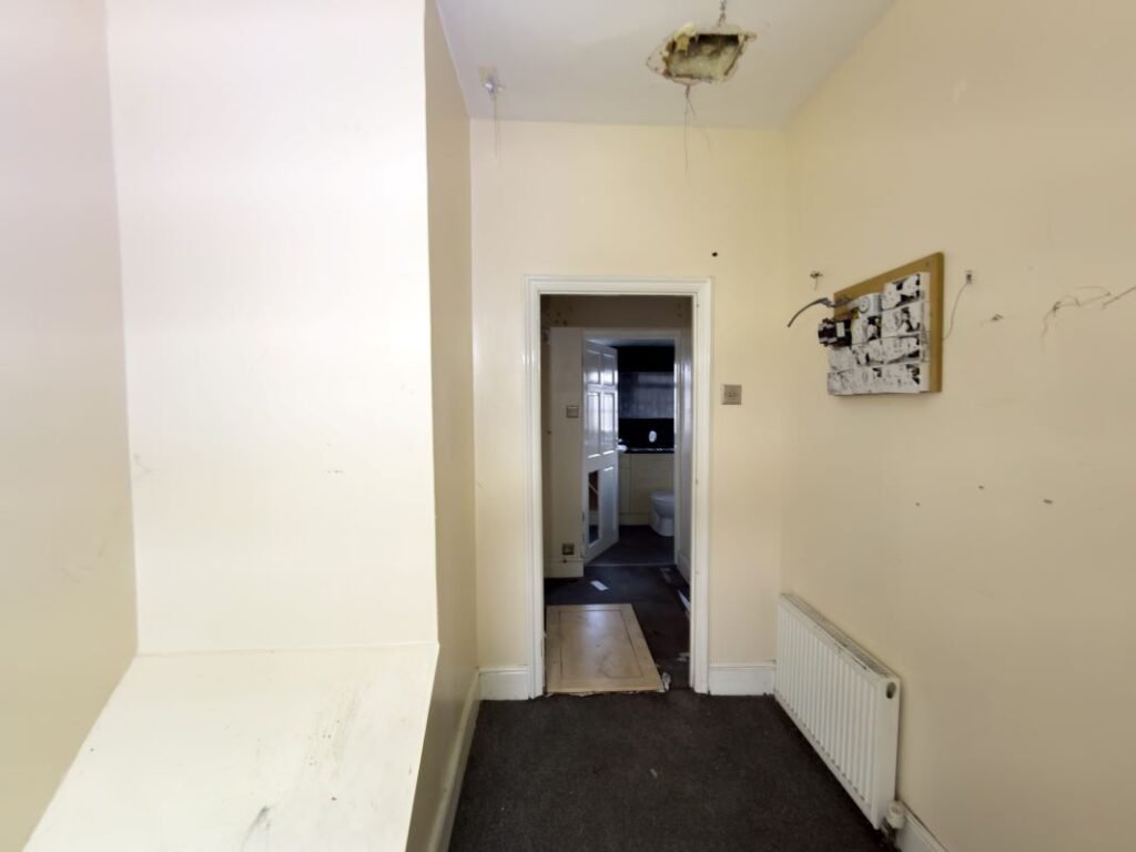 A quirky £80000 Burnopfield home hits auction featuring a bizarre bathroom with a toilet between two basins plus a spa bath fireplace lounge and garden in a village near Newcastle.