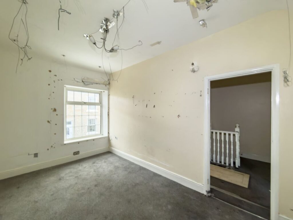 A quirky £80000 Burnopfield home hits auction featuring a bizarre bathroom with a toilet between two basins plus a spa bath fireplace lounge and garden in a village near Newcastle.