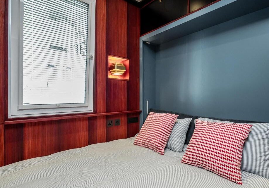 London studio flat smaller than a train carriage hits the market for £294,900, featuring ladder bed, fold-away furniture and full kitchen in Pimlico, central prime London.