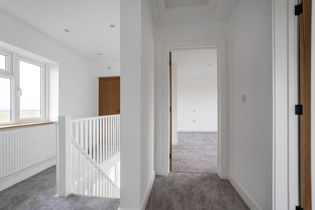 Renovated three bed countryside home near Cambridge lists for £600,000 with 5.5 acres of grassland, huge potential, planning permission and stunning open views.