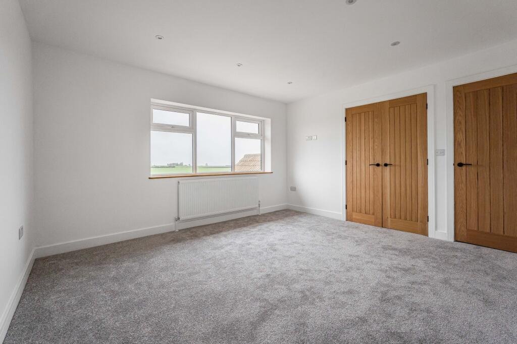 Renovated three bed countryside home near Cambridge lists for £600,000 with 5.5 acres of grassland, huge potential, planning permission and stunning open views.