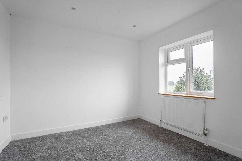 Renovated three bed countryside home near Cambridge lists for £600,000 with 5.5 acres of grassland, huge potential, planning permission and stunning open views.