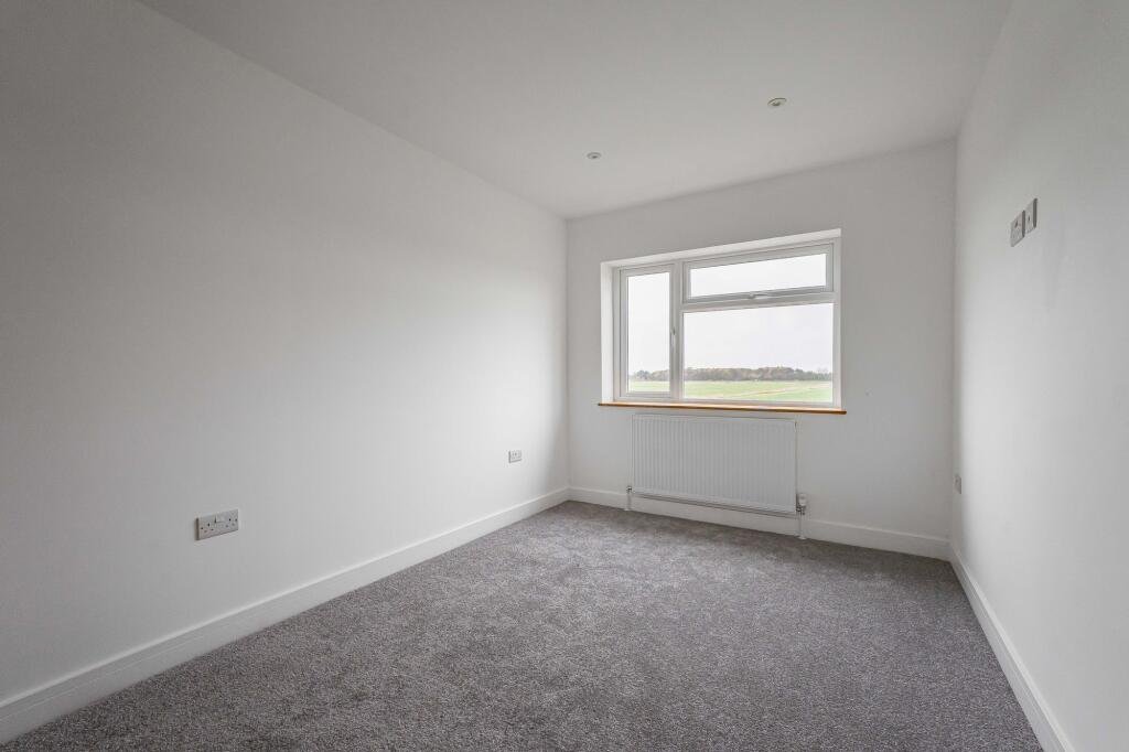 Renovated three bed countryside home near Cambridge lists for £600,000 with 5.5 acres of grassland, huge potential, planning permission and stunning open views.