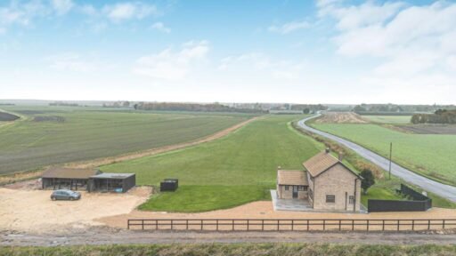 Renovated three bed countryside home near Cambridge lists for £600,000 with 5.5 acres of grassland, huge potential, planning permission and stunning open views.
